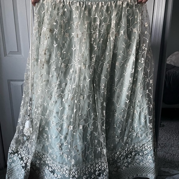 Turquoise Net Embroidered Lehenga Choli - Picture 6 of 9